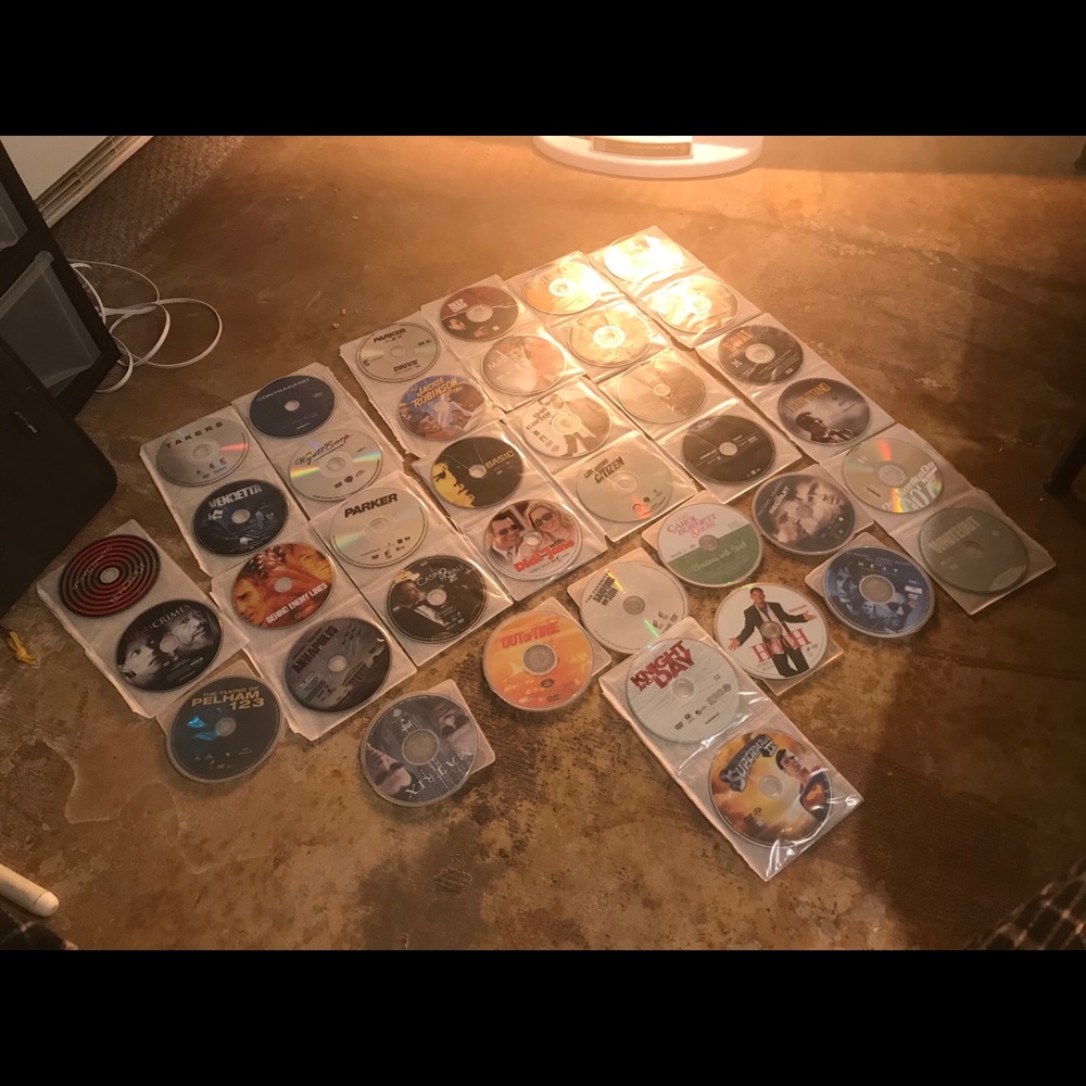 Movies DVDs and a DVD portable player